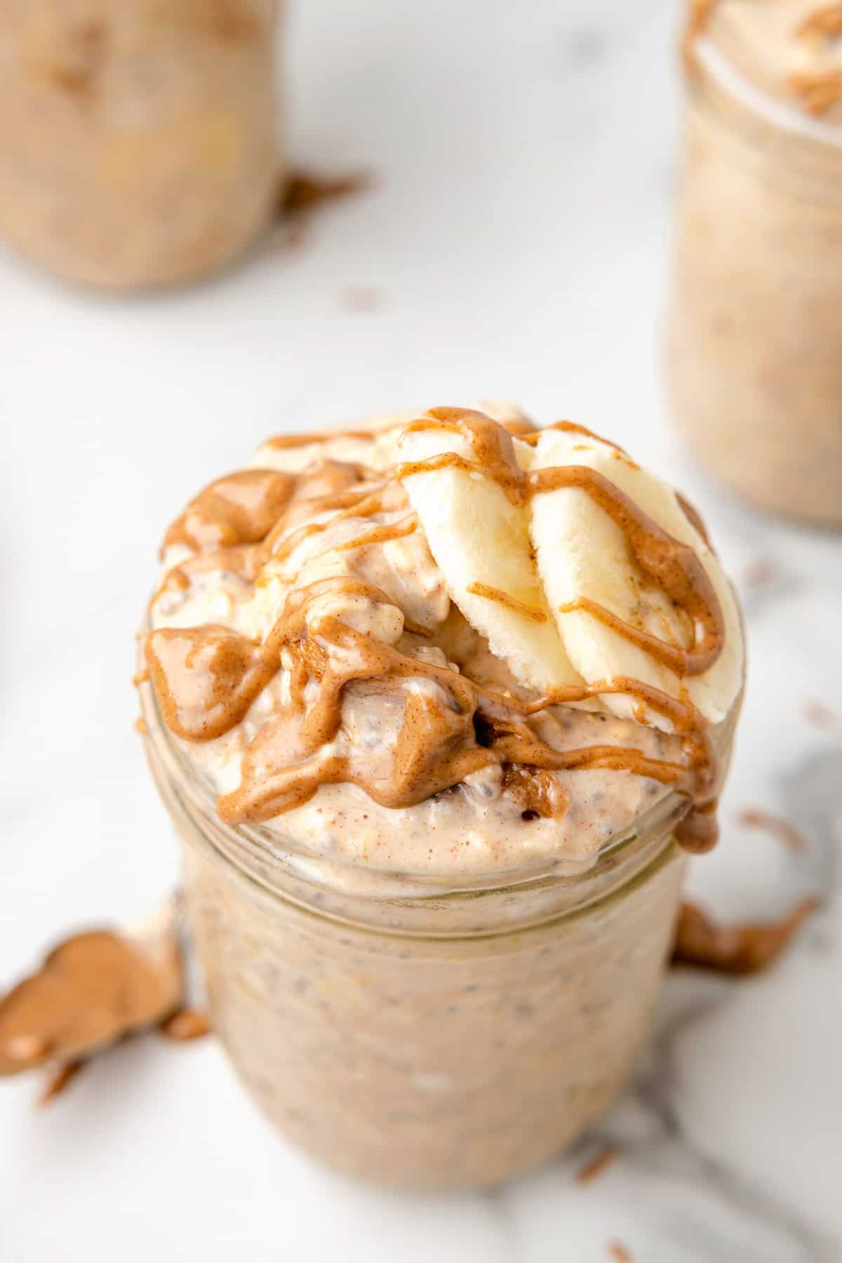 Jar of overnight oats with toppings.