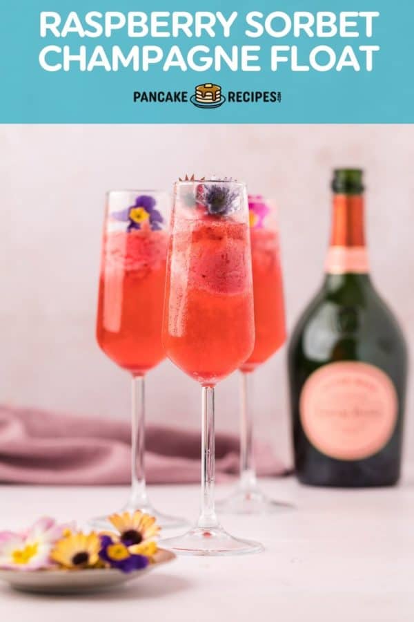 Champagne drink, text overlay reads "raspberry sorbet champagne float."