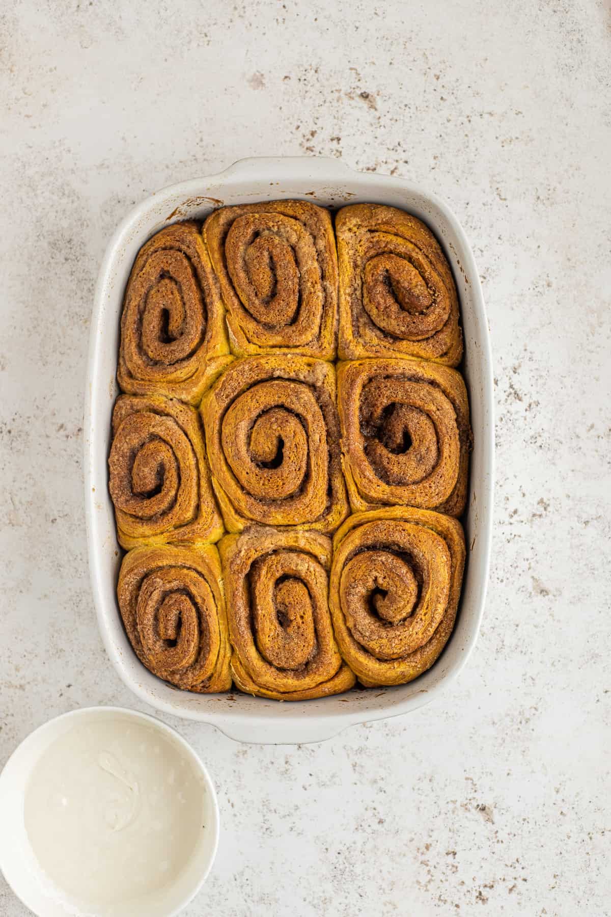 Baked unfrosted cinnamon rolls.