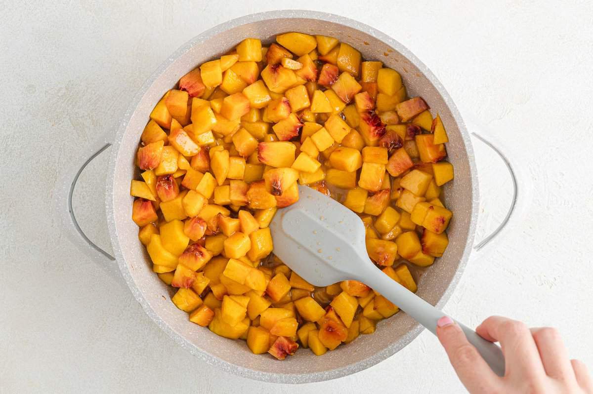 Peaches in pan, not yet cooked.