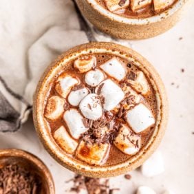 Oat milk hot chocolate topped with marshmallows.