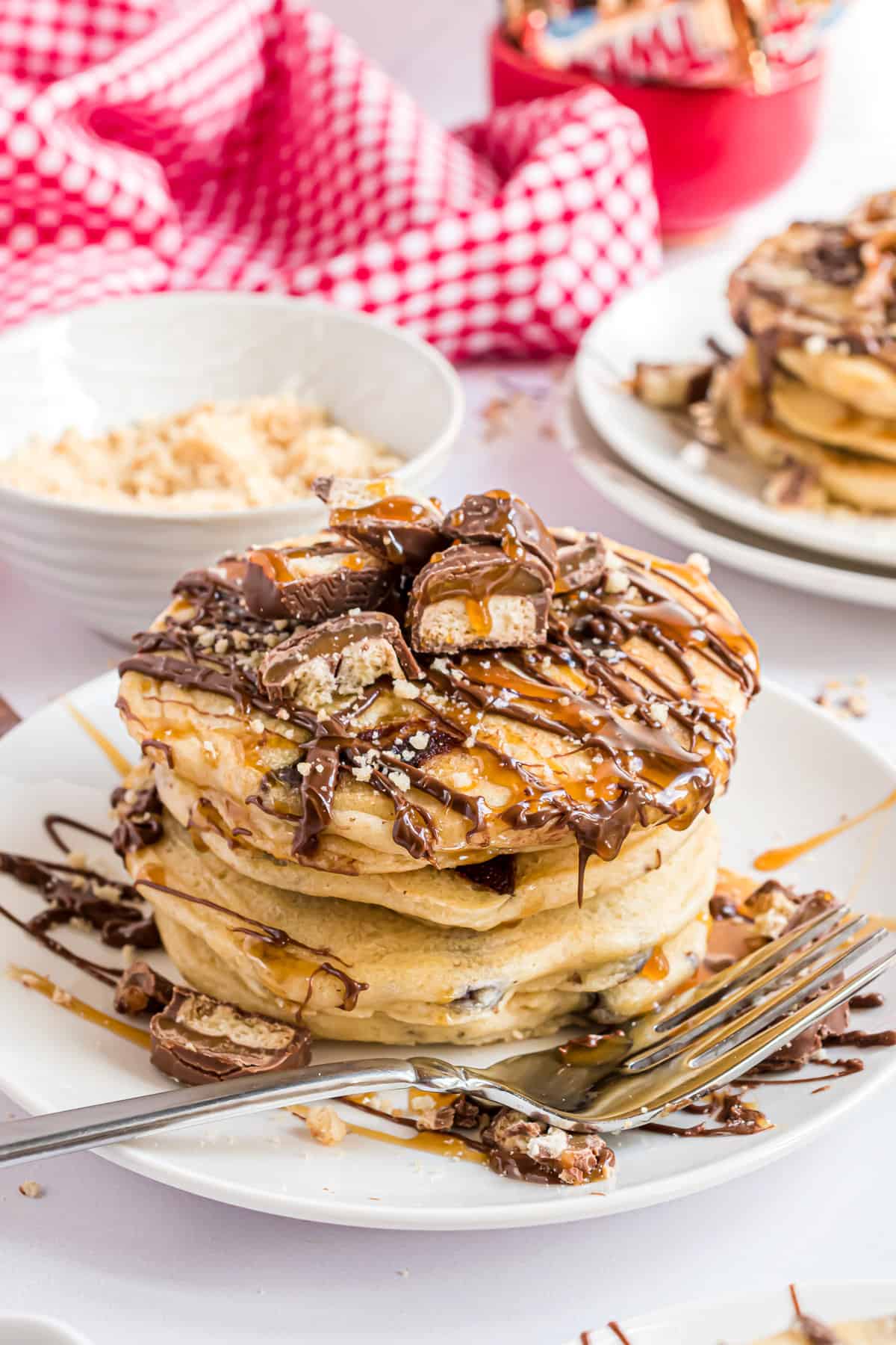 Pancakes piled high with toppings.