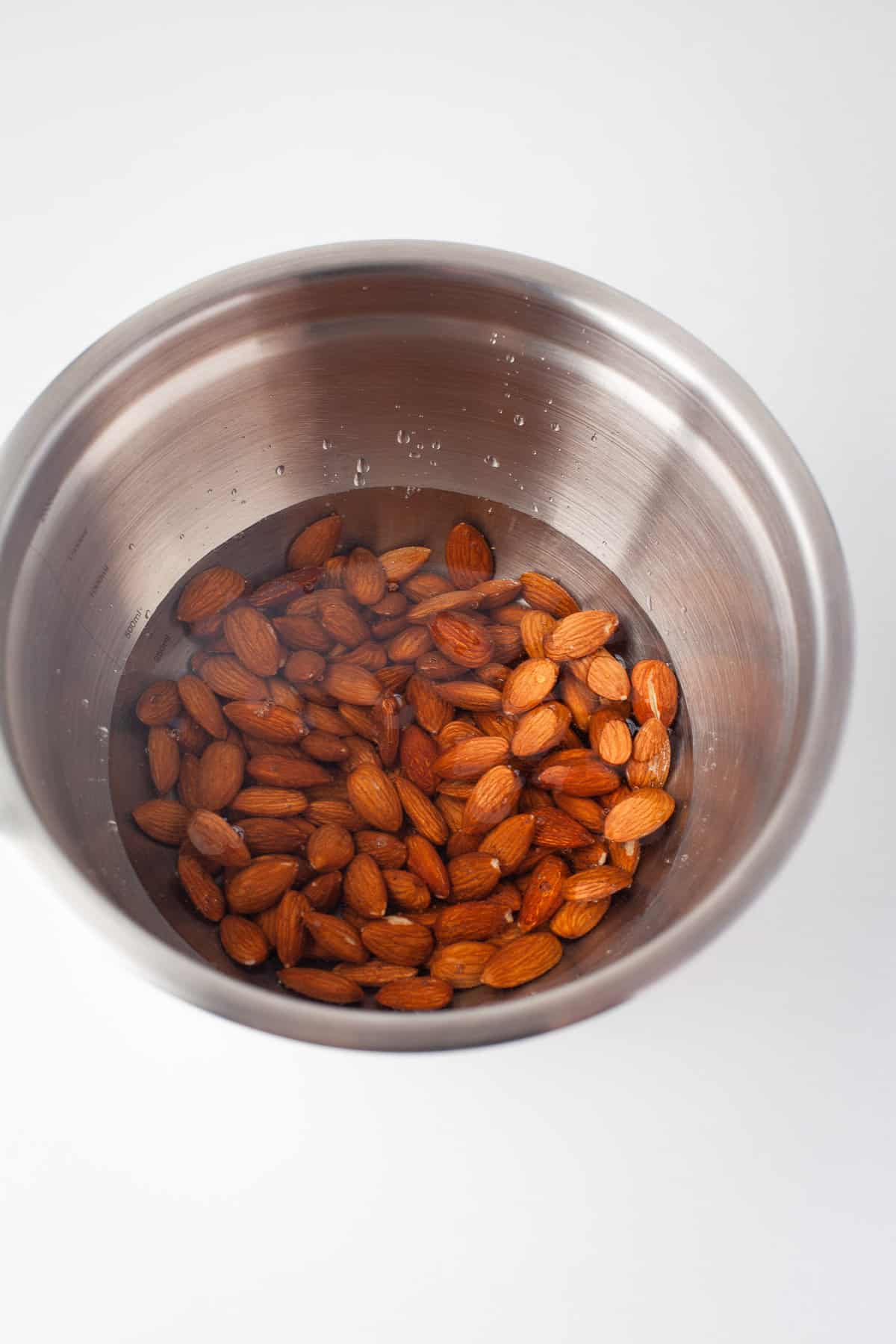 Almonds being soaked in water.