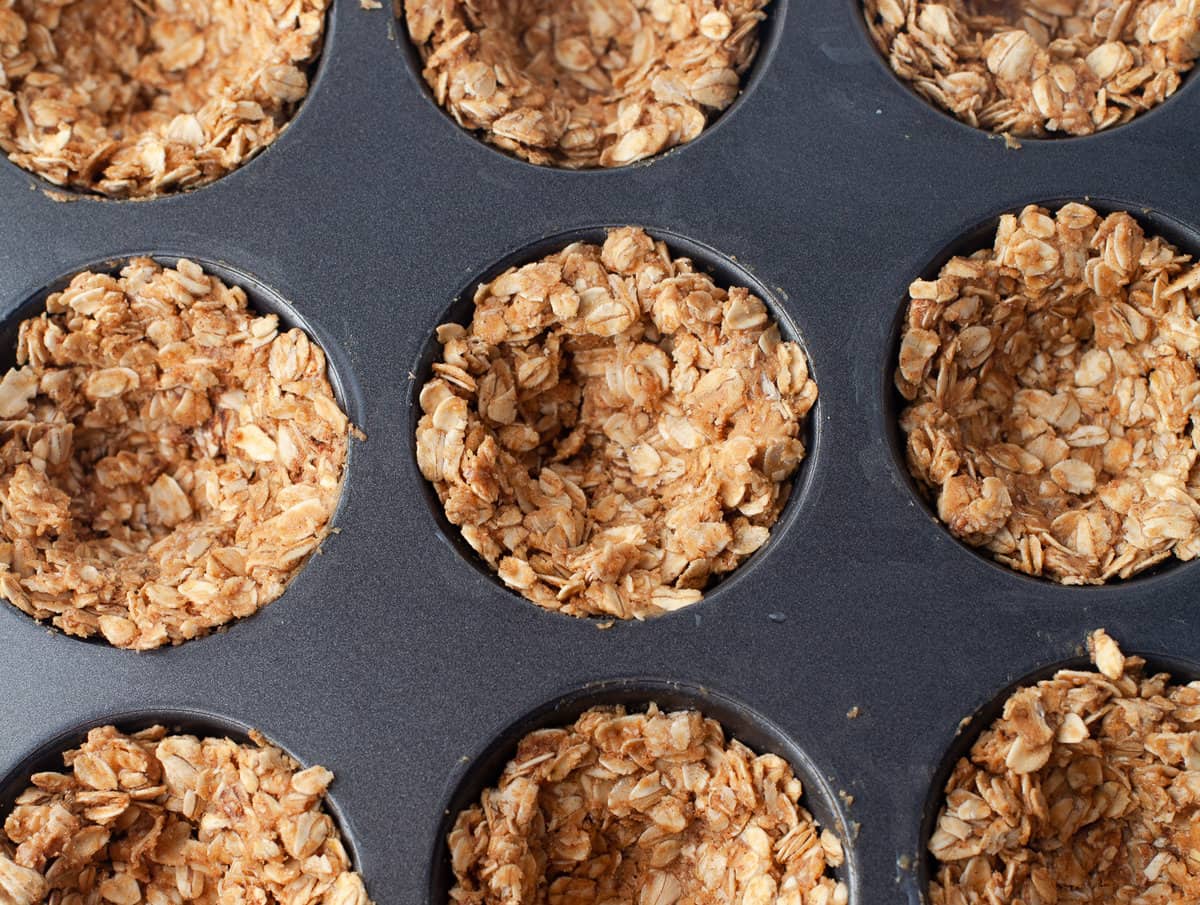 Baked oatmeal cups in tin.