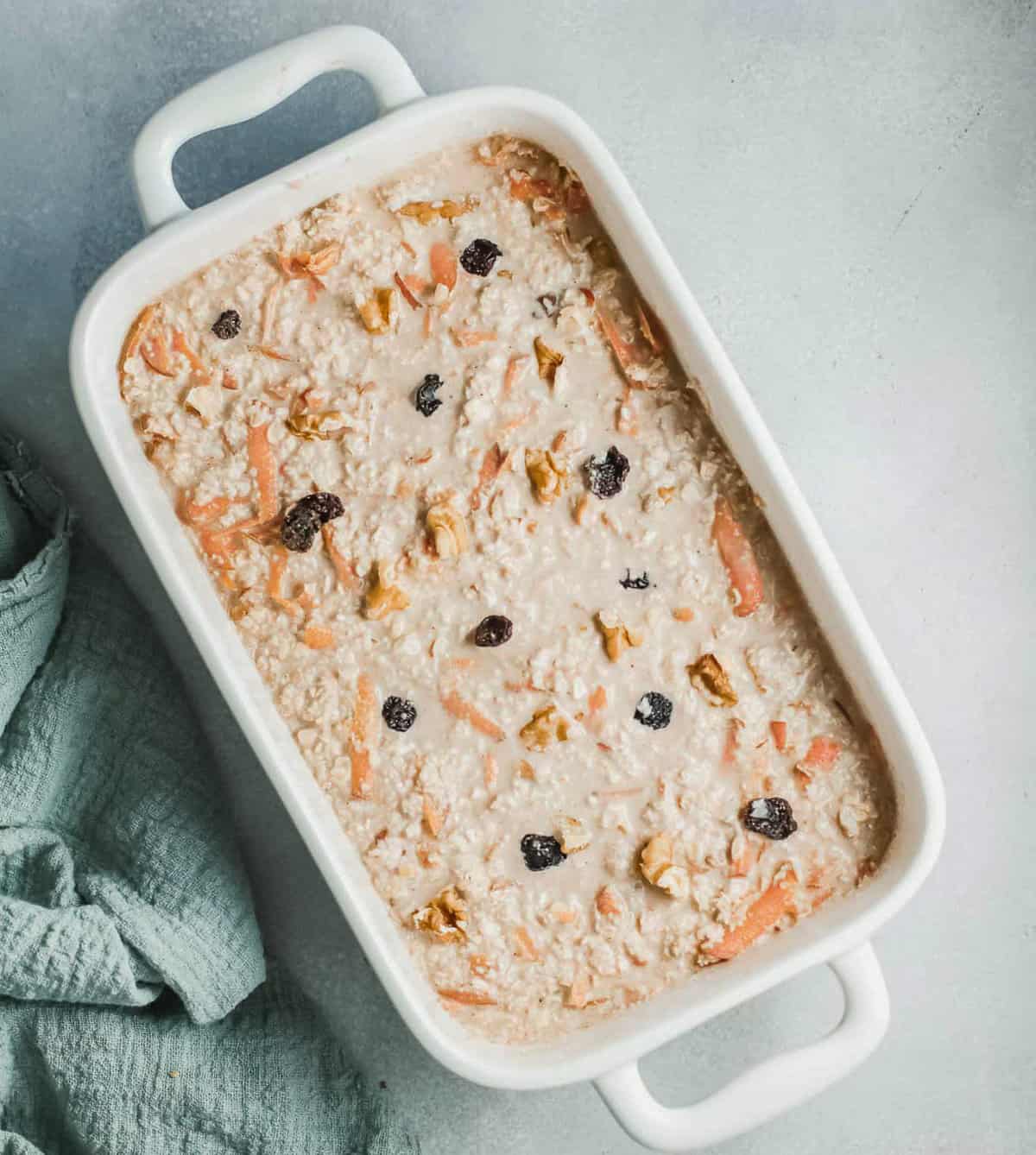 Unbaked oatmeal in a casserole dish.